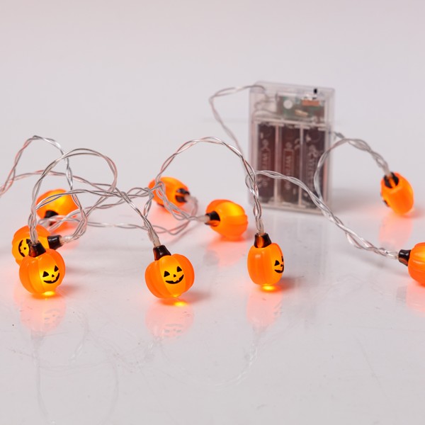 LÍNEA, 10 MINI LED, CALABAZA CON DISEÑO DE HALLOWEEN, CAJA DE PILAS 3xAA, TEMPORIZADOR, CABLE DE PVC TRANSPARENTE, LED BLANCO CÁLIDO, POR 15cm, CABLE DE CONDUCCIÓN 30cm, IP20