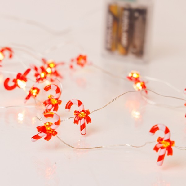 LÍNEA, 20 MINI LED, CARAMELO CON LAZO ROJO, CAJA DE PILAS 3xAA, TEMPORIZADOR, CABLE DE COBRE PLATEADO, LED BLANCO CÁLIDO, POR 10cm, CABLE DE CONDUCCIÓN 30cm, IP20