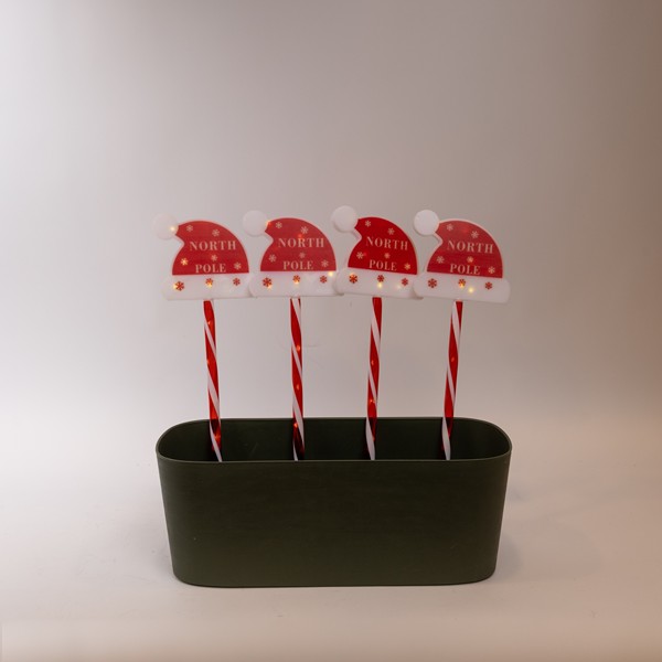 LÍNEA, 36 MINI LED, 4 SEÑALES DE PLÁSTICO CON SOMBRERO DE PAPÁ NOEL EN LA PARTE SUPERIOR DE 12 cm, CON PISTA DE TIERRA DE 37 cm, PANEL SOLAR CON SENSOR DE LUZ, 8 M/H, CABLE DE COBRE PLANO TRANSPARENTE, LED BLANCO CÁLIDO, POR 1 m, IP44