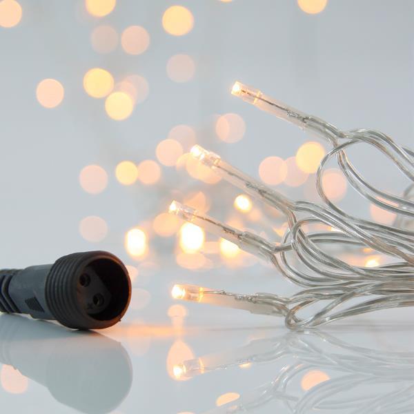 LÍNEA, 100 LED 3 mm, ADAPTADOR 31 V, 4 CONECTORES HASTA 3 JUEGOS, CABLE PVC TRANSPARENTE, LED BLANCO CÁLIDO, POR 5 cm, CABLE 3 m, IP44