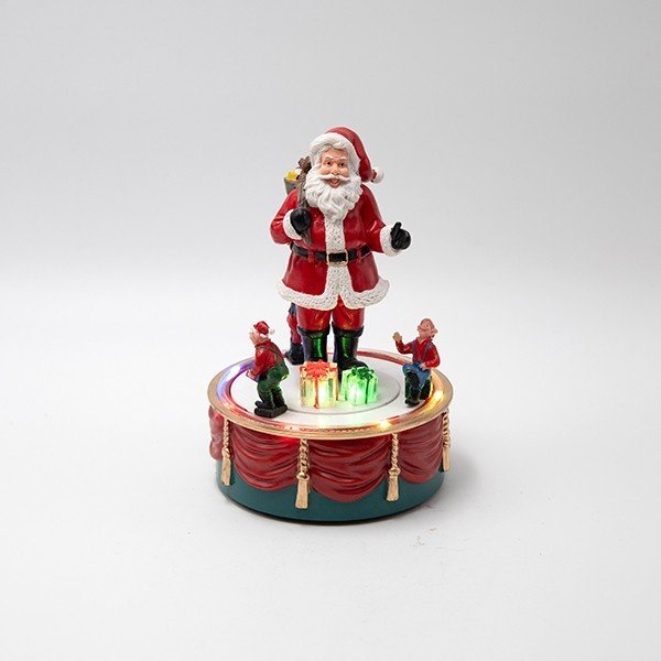 PAPÁ NOEL SOBRE A GIRATORIO BASE, PILA FUNCIONAMIENTO, 13X13X19CM